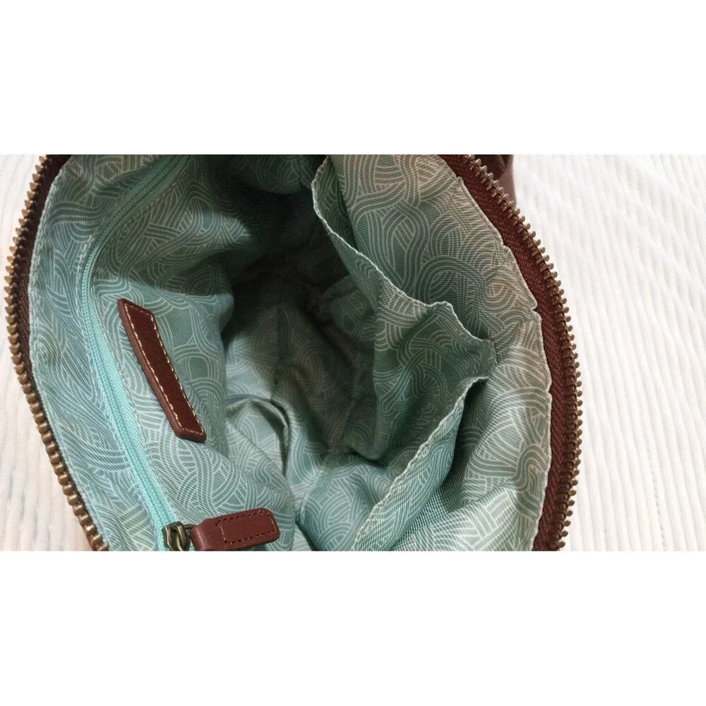The Sak Crossbody Purse Cognac – Multi-Panel Metallic Detail.